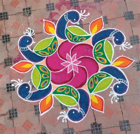 Peacock kolam | Free hand rangoli design, Simple rangoli border designs, Rangoli designs with dots