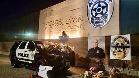 Growing memorial for fallen police officer at Carrollton police ...