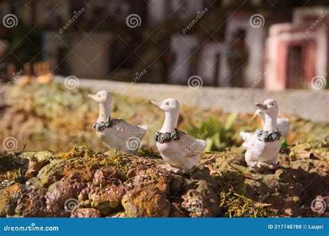 Small Plastic Ducks that Decorate an Urban Garden Stock Photo - Image ...