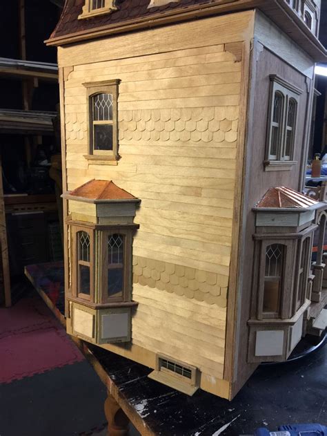 A Doll House Is Being Built On A Dolly