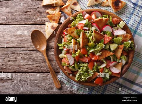 Traditional Arabic Fattoush Salad On A Plate On The Table Horizontal