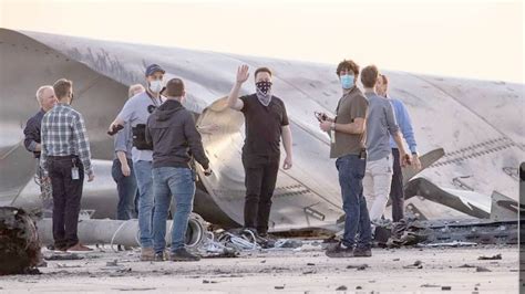 Elon Musk and the SpaceX team inspects the remains of Starship SN8 ...