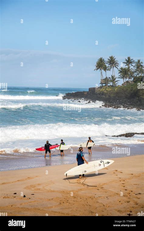 Hawaii Oahu North Shore Surfers At Waimea Bay Stock Photo Alamy