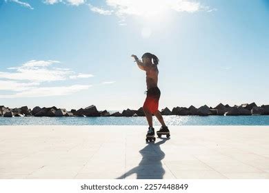 Black Man On Roller Skates Riding Stock Photo 2257448849 | Shutterstock