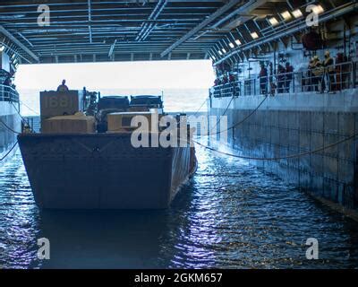 A Landing Craft Utility Enters The Well Deck Of The Amphibious Assault