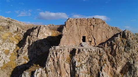 Cave entrance in the castle. Aerial view of the cave entrance inside the castle built on the ...