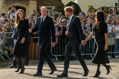 Harry And Meghan Appear To Hold Hands Leaving Queens Funeral