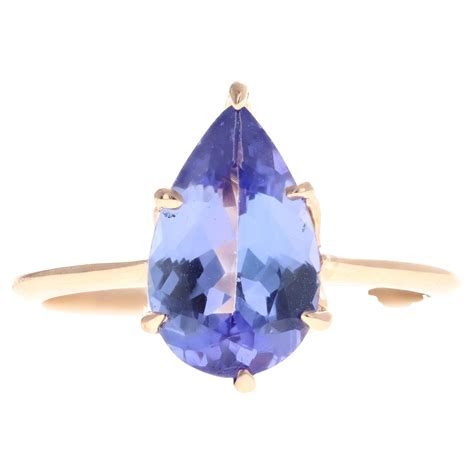 mermaid tanzanite vintage inspired tapered  karat white gold