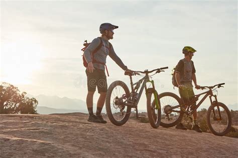 This Is A Mountain Bikers Heaven Full Length Shot Of Two Men Out