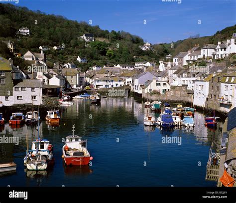 View Over The Picturesque Fishing Boat Harbour In The Quaint Cornish