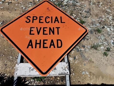 Special Event Ahead Road Sign Lying On The Ground Because Of Social