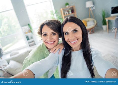 Portrait Of Two Cute Cheerful People Embrace Toothy Smile Make Selfie