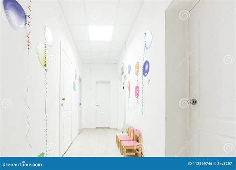 Bright Corridor Hallway Of A Nursery School During The Holidays Without