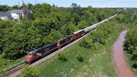 Awesome Aerial View In K Two Sd Is Lead A Long Freight Train Cn