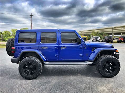 Blue Jeep Wrangler Lifted