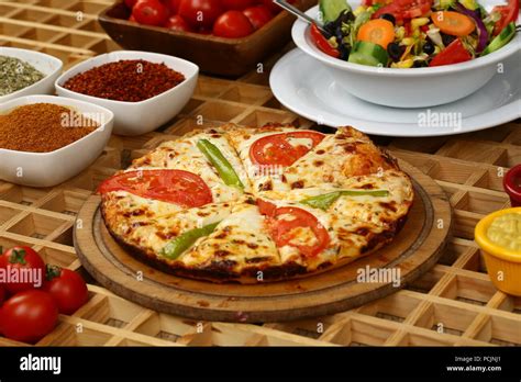 Fresh Italian Pizza With Tomato And Mozzarella Cheese Stock Photo Alamy