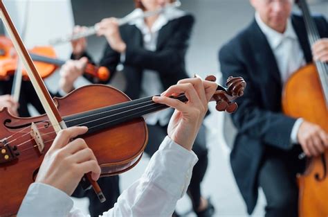 Premium Photo Classical Orchestra String Section Performing