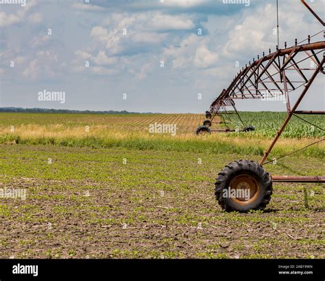 Rusty Old Center Pivot Irrigation System Stretching Over Rolling Hills