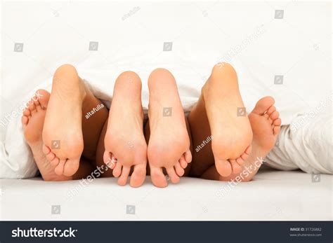 Three Pairs Feet Having Fun Bed Stock Photo 31726882 Shutterstock