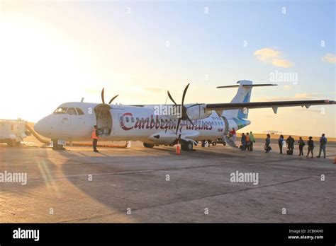 BRIDGETOWN, BARBADOS - FEBRUARY 21, 2014: Caribbean Airlines plane ...