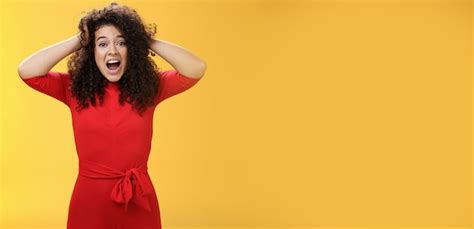 Free Photo Girl Feeling Pressure Standing Anxious In Panic Holding Hands On Curly Hair Yelling