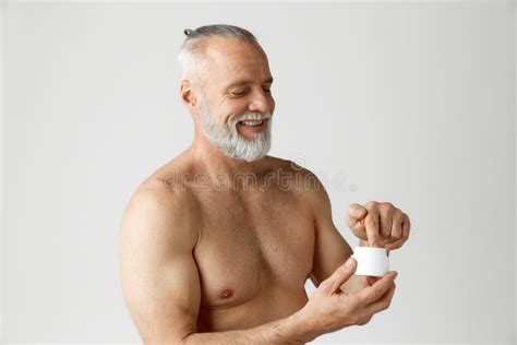 Portrait Of Handsome Mature Gray Haired Man Smiling M Standing
