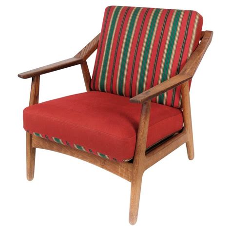 Armchair In Oak And Upholstered With Red Fabric By H Brockmann