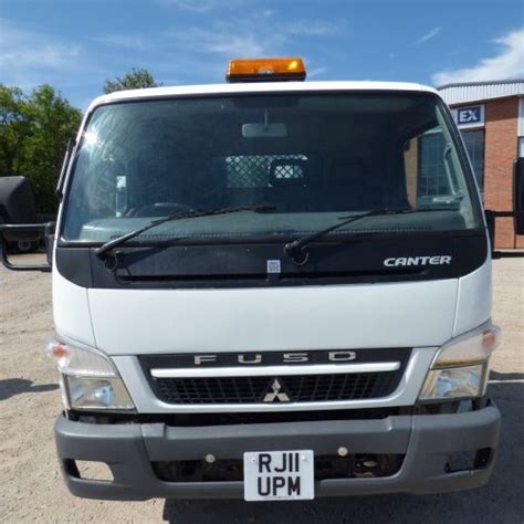 MITSUBISHI FUSO CANTER 7 5 TONNE SKIP LOADER 2011 RJ11 UPM Fleetex