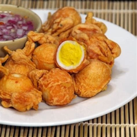 Kwek Kwek Deep Fried Battered Quail Eggs Served With Chilli Vinegar