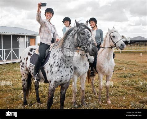 Selfies In The Saddle Three Attractive Young Women Taking Selfies