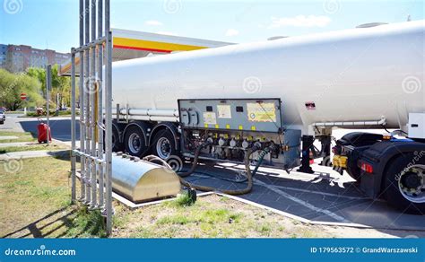 Fuel Tanker Truck At The Gas Station Shell Refuelling A Gas Station