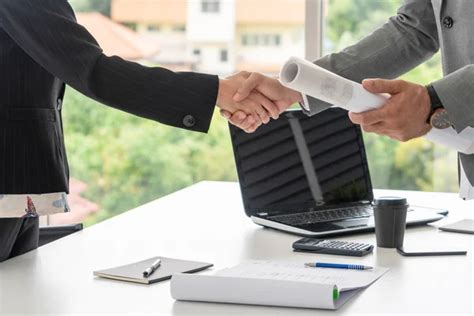 Businessman Executive Handshake With Businesswoman Worker In Modern