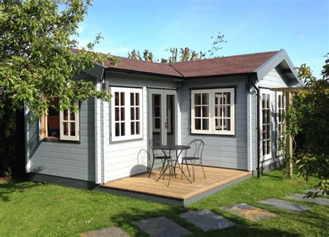 L Shaped Garden Room With Traditional Georgian Style Windows And Doors