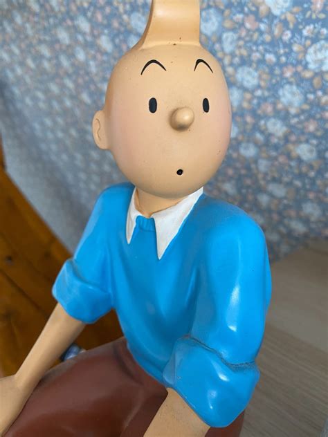 Tintin Statuette Leblon Delienne 45 Tintin Assis Pull Catawiki