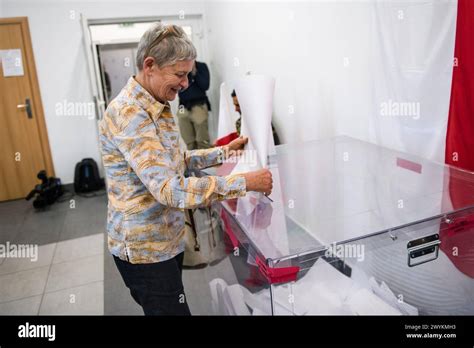 A Woman Casts Her Vote At The Polling Station During The Local