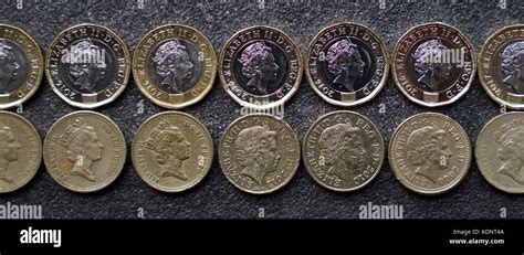 Examples Of The Old 1 Pound Coins Bottom And The New Ones Replacing It As From Midnight On