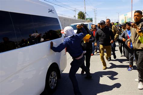 Migrantes recibieron a AMLO en Ciudad Juárez con gritos y protestas