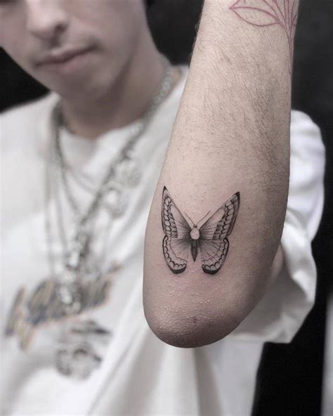 Single Needle Butterfly Tattoo On The Left Forearm