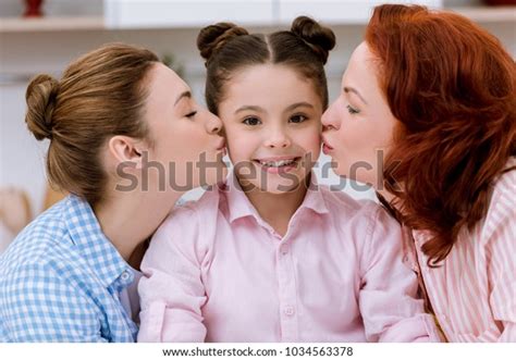 Closeup Portrait Granny Mother Kissing Daughter Foto De Stock 1034563378 Shutterstock