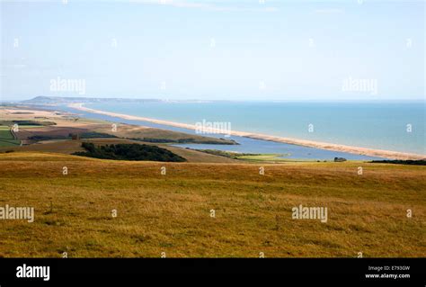 View West Along Chesil Beach Tombolo And The Fleet Lagoon From