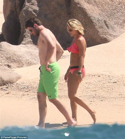 Carrie Underwood Shows Off Toned Abs In Frilly Pink Bikini From Her