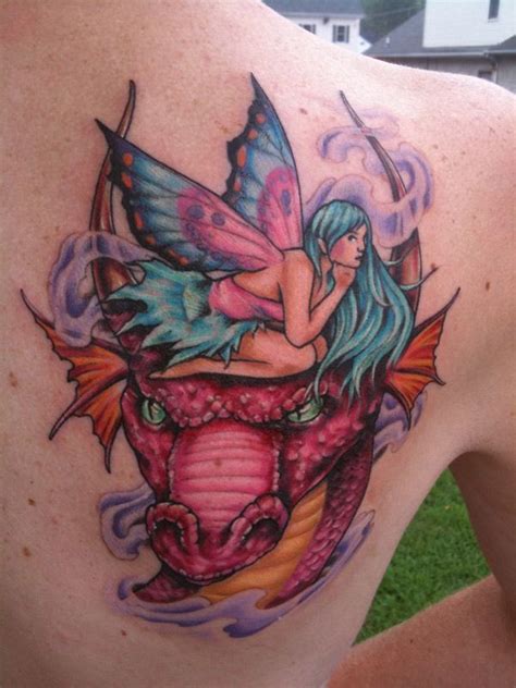 Fairy Dragon Tattoo Fairy On Dragons Head Tattoo Dragon Head Tattoo