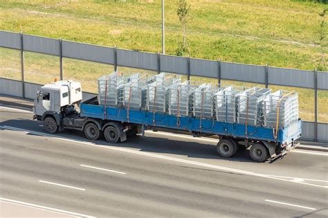 premium photo transportation  delivery  cargo   open trailer