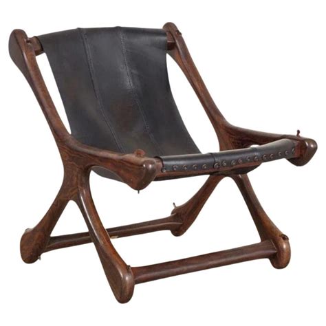 S Lounge Chair And Ottoman In Cowhide At Stdibs