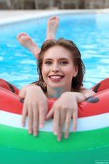 Naughty Girl Aristeia In Blue Bikini Strips And Has Fun In The Pool Photos