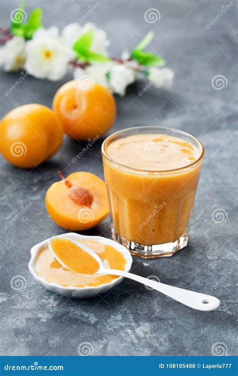 Yellow plum jam in glass stock photo. Image of grey - 108105488