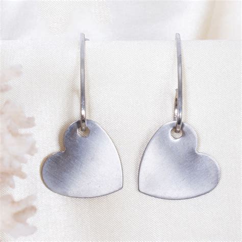 Buy Ayesha Metallic Silver Curved Bar Earrings With A Heart Shaped