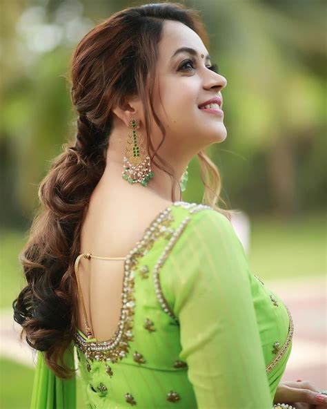 Actress Bhavana Latest Photos In Green Colour Half Saree 003