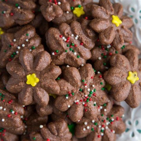 A Plate Full Of Chocolate Spritz Cookies Spritz Cookie Recipe Cookie