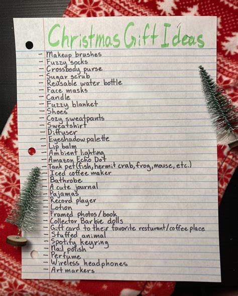 A Christmas T Ideas List On Top Of A Red And White Napkin With A